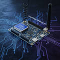 LilyGO TTGO LoRa32 ESP32 development board with LoRa antenna and OLED display